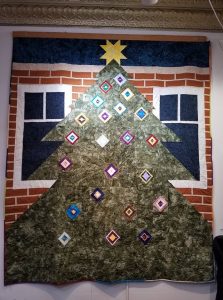 Christmas Quilt with Ojo de Dios ornaments